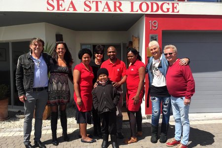 Rocco (front) was very anxious to get on the boat, with his Mom, Lesley Lesperance behind him. Left are Frank and Rita van den Berg (Sea Star Lodge) with their staff members in the middle and right are Launa and Guy van Cuyck from Hermanus  